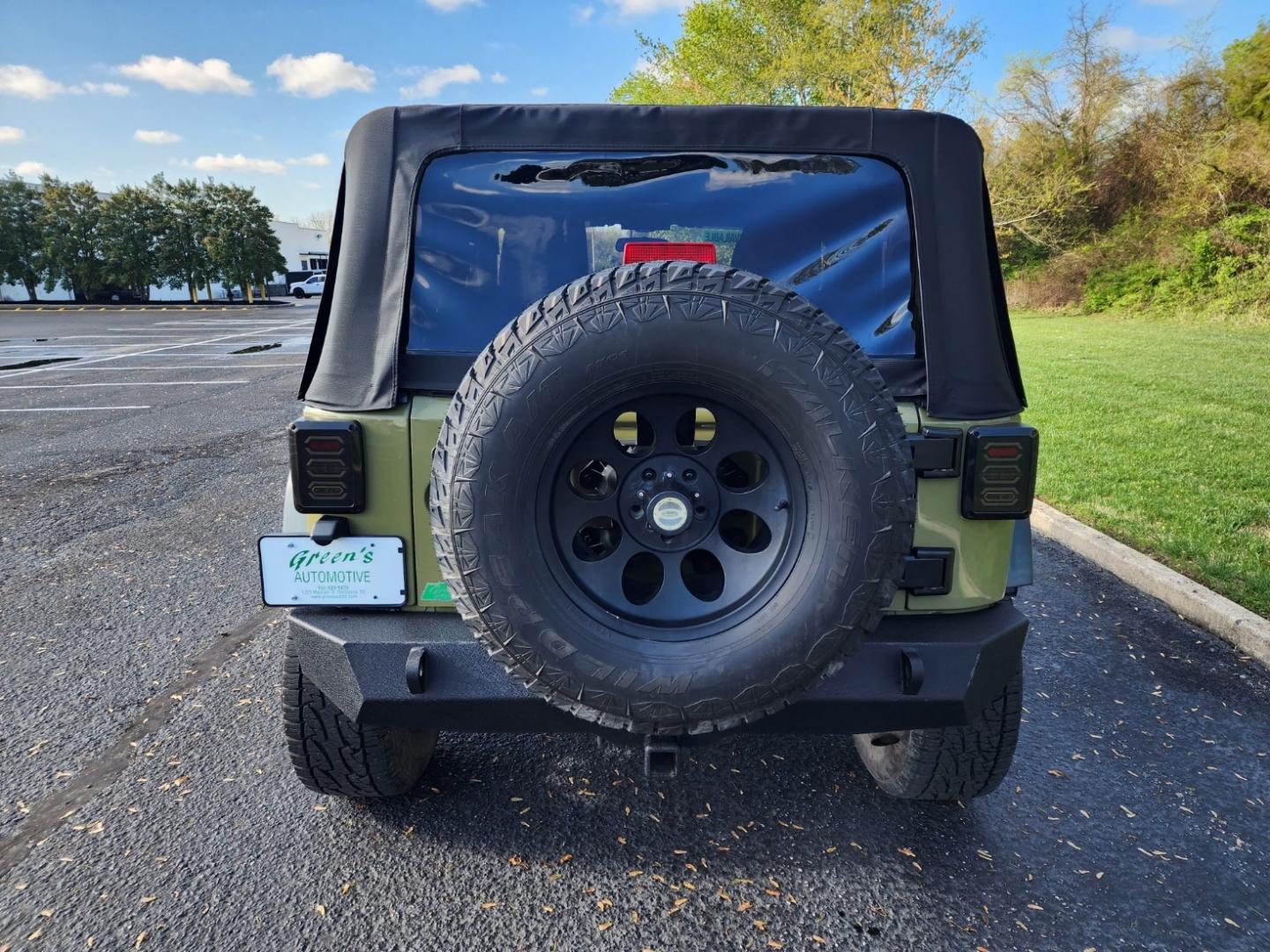 2013 Green /Black Jeep Wrangler Sport (1C4AJWAG3DL) with an 3.6 V-6 engine, 6 Speed manual transmission, located at 1221 Madison St., Shelbyville, TN, 37160, (931) 680-9439, 0.000000, 0.000000 - Photo#2